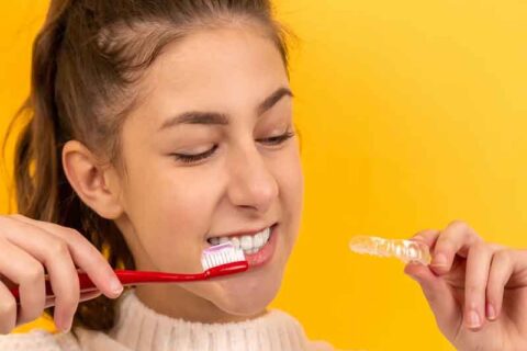 Girl is holding Braces